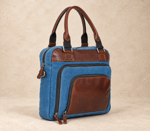 Blue textile business bag with cognac trim AIL-BUB-0013, shown from a front three-quarter angle