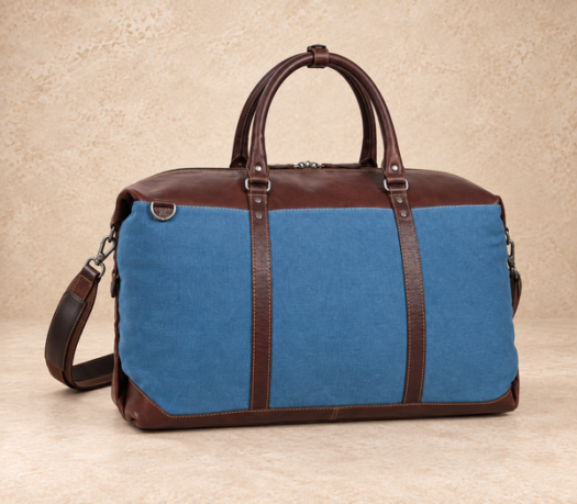 Blue textile and brown leather duffle bag AIL-DUB-0018 shown from a front three-quarter angle