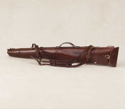 Cognac Brown Leather Hunting Gun Case AIL-HP-0005 primary side view on warm limestone studio background