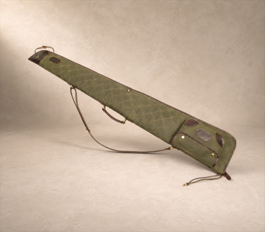 Olive Quilted Hunting Gun Case AIL-HP-0007 angled side view on warm limestone studio background