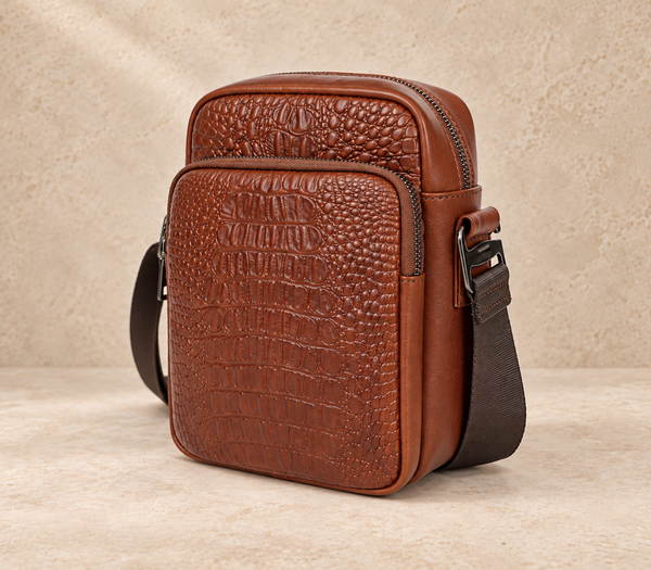 Cognac crocodile-embossed leather crossbody bag AIL-MB-0007 shown from a front angled view