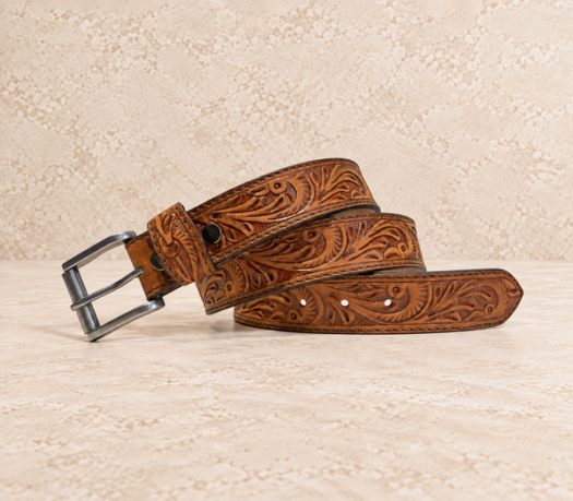 Cognac tooled men’s belt AIL-MBELT-0001 in a coiled front view
