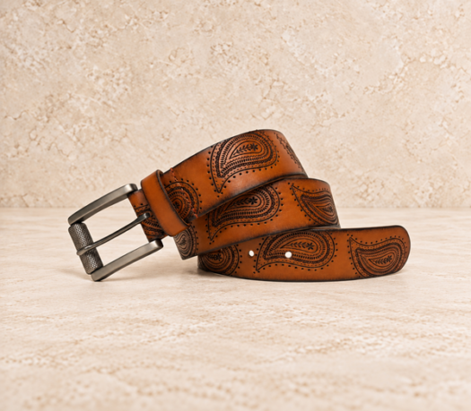 Tan paisley-tooled men’s belt AIL-MBELT-0048 in a coiled front view