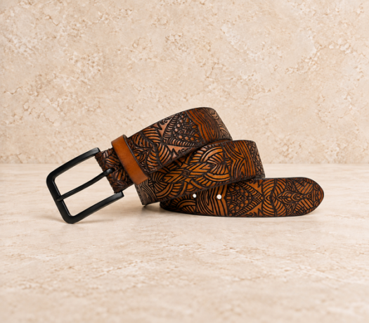 Brown leaf-tooled men’s belt AIL-MBELT-0049 in a coiled front view